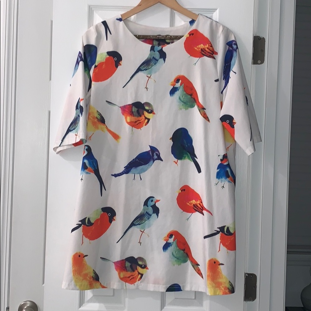 Short oversized bird dress